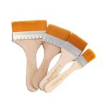 A set of four wooden handle flat utility paint brushes neatly arranged.